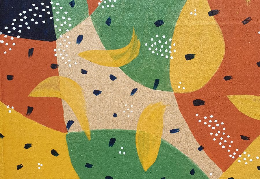 motifs abstraits bleu, rouge, jaune blanc réalisé sur un morceau de carton